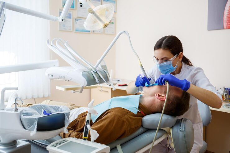 Dental Implants vs. Dentures: Dr. Dmitriy Aminov Explains Your Tooth Replacement Options